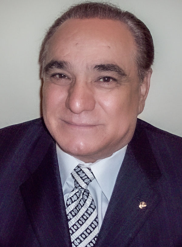Dr. John Corella, Vice-President